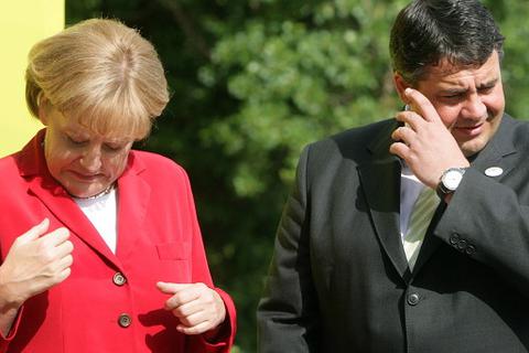 Sigmar Gabriel steht "endlich" wieder offiziell auf der Seite von "Mutti" Merkel. Foto: dpa